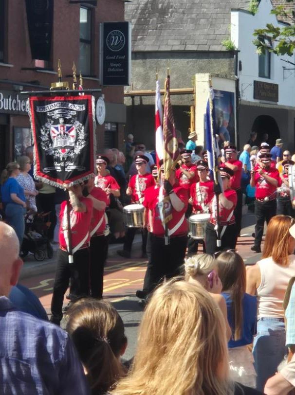 A marching band coming down the main street in Larne