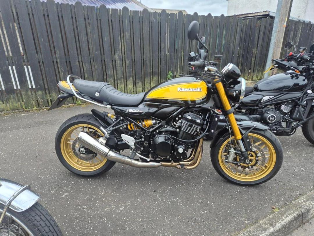 A yellow and black Kawasaki Z900RS