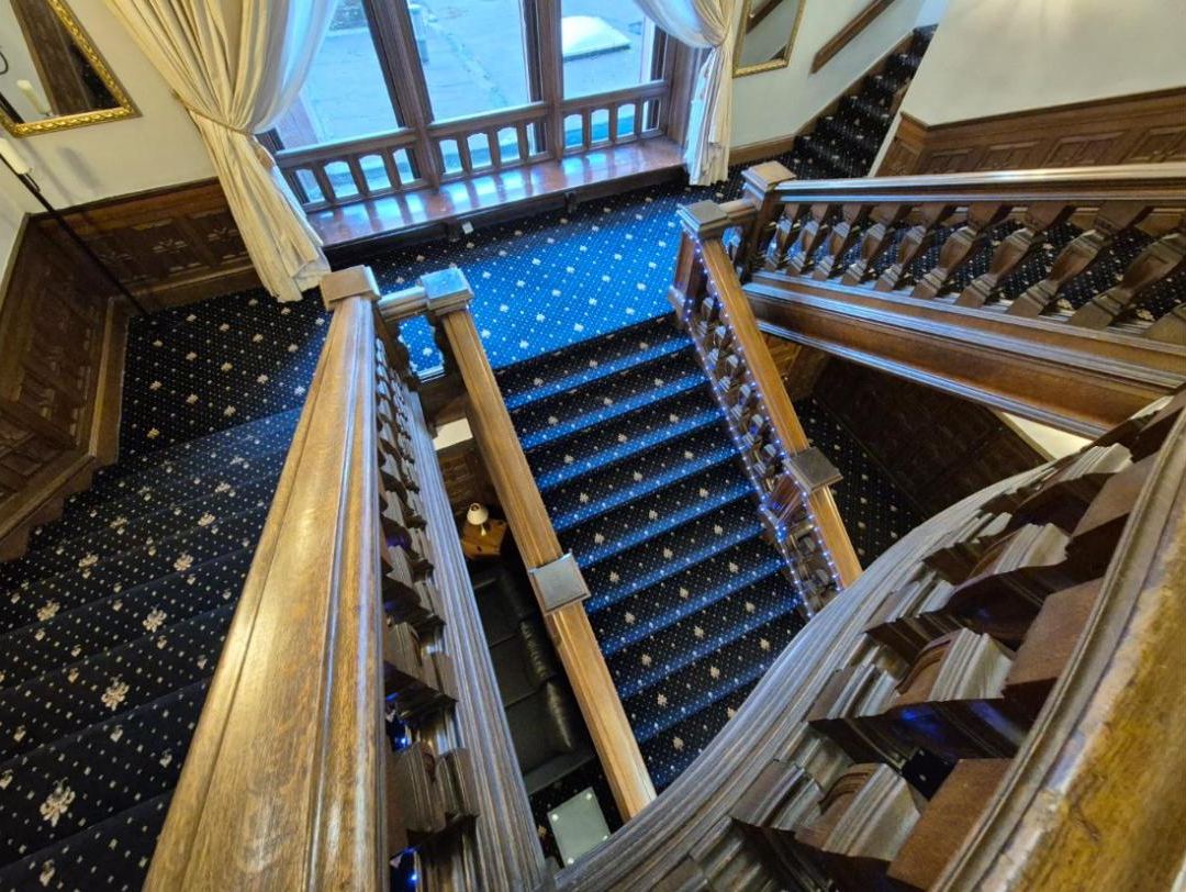 The staircase from the landing above