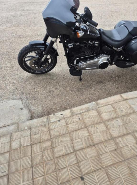 The Harley at a fuel stop on the long ride across Spain