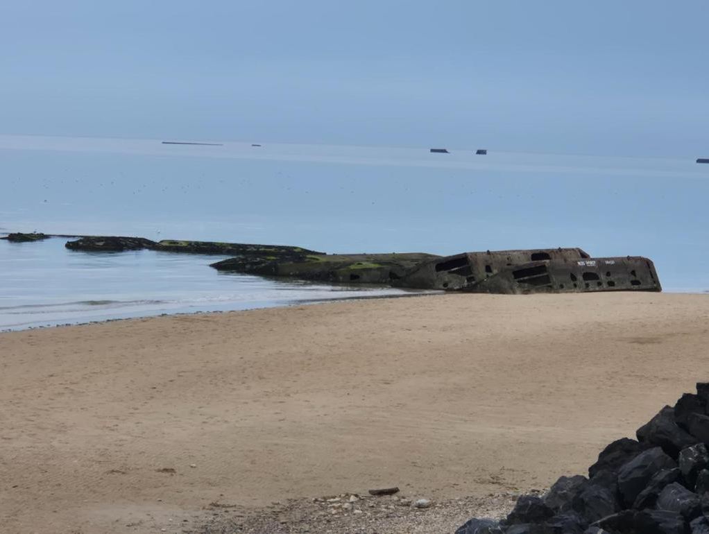 Mulberry harbour remains on the sand