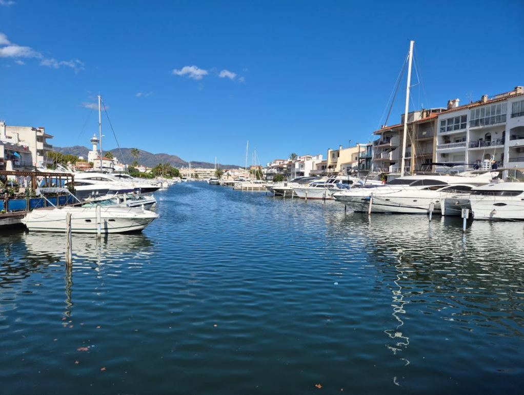 Boats moored along the main canal